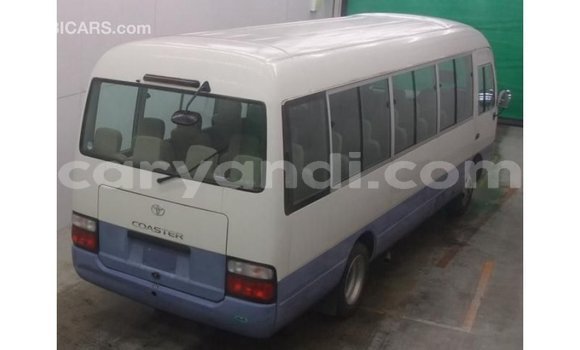 Acheter Import Voiture Toyota Coaster Blanc à Import - Dubai, Zambie Acheter Import Voiture Toyota Coaster Blanc à Import - Dubai, Zambie