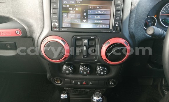 Nunua Ilio tumika Jeep Wrangler Nyekundu Gari ndani ya Lusaka nchini Zambia Nunua Ilio tumika Jeep Wrangler Nyekundu Gari ndani ya Lusaka nchini Zambia