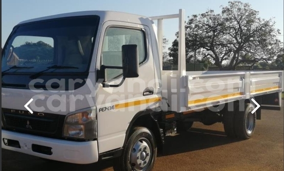 Buy Used Mitsubishi FTO White Car in Solwezi in North-Western