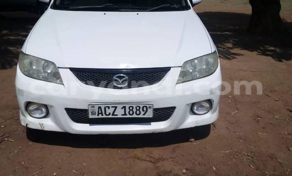 Buy Used Mazda Familia White Car in Chambishi in Copperbelt Buy Used Mazda Familia White Car in Chambishi in Copperbelt