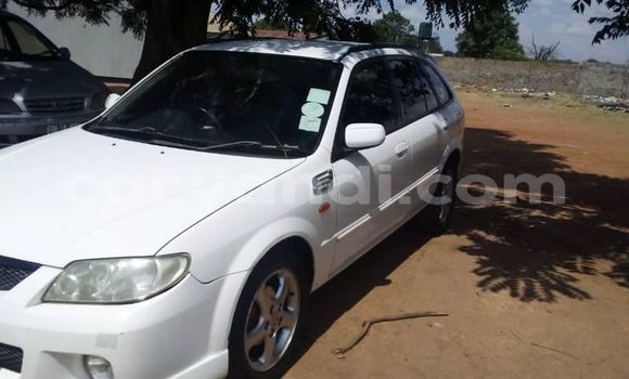 Buy Used Mazda Familia White Car in Chambishi in Copperbelt Buy Used Mazda Familia White Car in Chambishi in Copperbelt