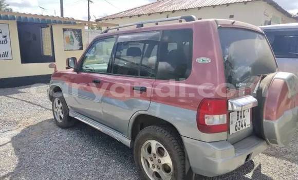 Acheter Occasion Voiture Mitsubishi Pajero iO Rouge à Lusaka, Zambie Acheter Occasion Voiture Mitsubishi Pajero iO Rouge à Lusaka, Zambie