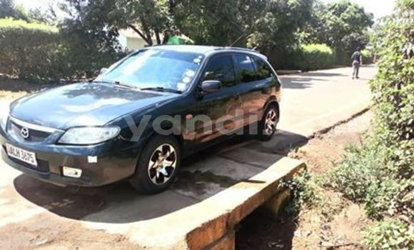 Acheter Occasion Voiture Mazda Familia Noir à Lusaka, Zambie Acheter Occasion Voiture Mazda Familia Noir à Lusaka, Zambie