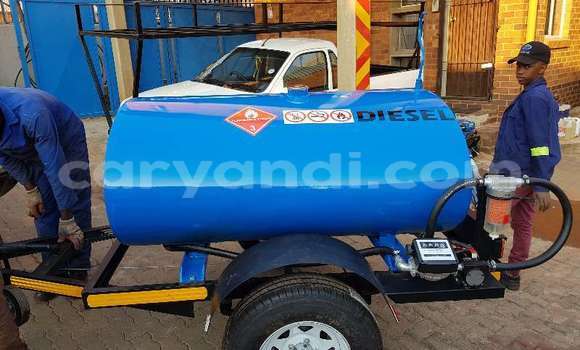 Buy New Caterpillar 120 White Truck in Lusaka in Zambia