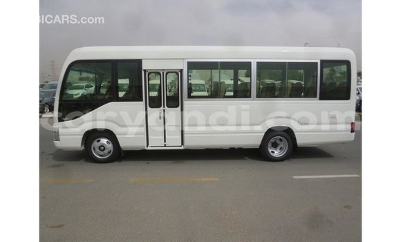 Nunua Imported Toyota Coaster Nyeupe Gari ndani ya Import - Dubai nchini Zambia Nunua Imported Toyota Coaster Nyeupe Gari ndani ya Import - Dubai nchini Zambia