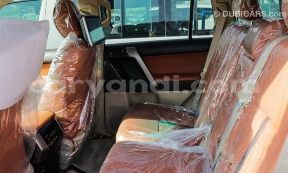 Acheter Import Voiture Toyota Prado Rouge à Import - Dubai, Zambie Acheter Import Voiture Toyota Prado Rouge à Import - Dubai, Zambie