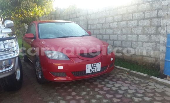 Buy New Mazda 323 Red Car in Chingola in Zambia