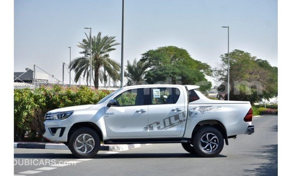 Buy Import Toyota Hilux White Car in Import - Dubai in Zambia Buy Import Toyota Hilux White Car in Import - Dubai in Zambia