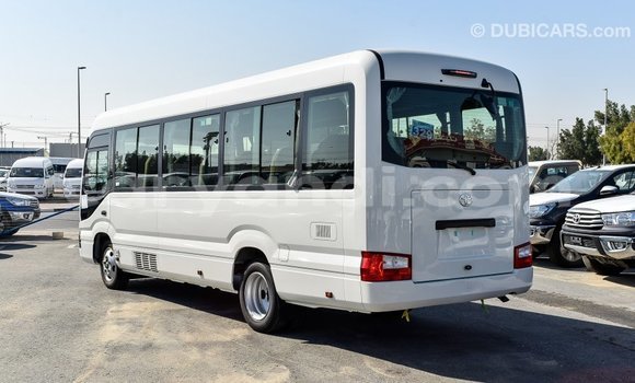 Acheter Import Voiture Toyota Coaster Blanc à Import - Dubai, Zambie Acheter Import Voiture Toyota Coaster Blanc à Import - Dubai, Zambie