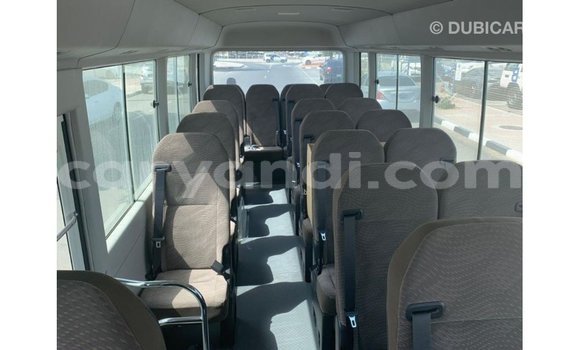 Acheter Import Voiture Toyota Coaster Blanc à Import - Dubai, Zambie Acheter Import Voiture Toyota Coaster Blanc à Import - Dubai, Zambie