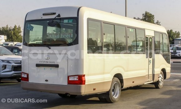 Acheter Import Voiture Toyota Coaster Blanc à Import - Dubai, Zambie Acheter Import Voiture Toyota Coaster Blanc à Import - Dubai, Zambie