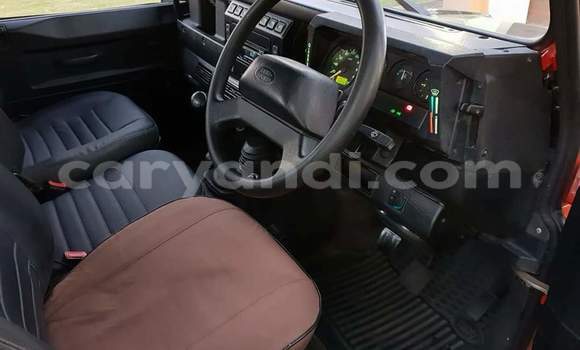 Acheter Occasion Voiture Land Rover Defender Rouge à Lusaka, Zambie Acheter Occasion Voiture Land Rover Defender Rouge à Lusaka, Zambie