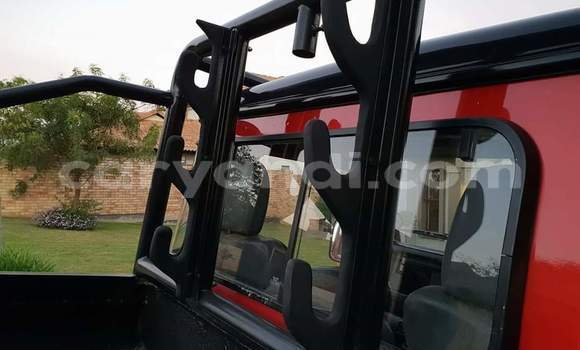 Acheter Occasion Voiture Land Rover Defender Rouge à Lusaka, Zambie Acheter Occasion Voiture Land Rover Defender Rouge à Lusaka, Zambie