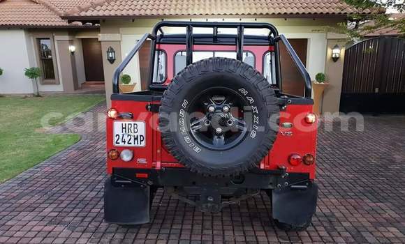 Acheter Occasion Voiture Land Rover Defender Rouge à Lusaka, Zambie Acheter Occasion Voiture Land Rover Defender Rouge à Lusaka, Zambie