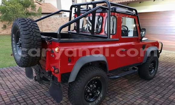 Acheter Occasion Voiture Land Rover Defender Rouge à Lusaka, Zambie Acheter Occasion Voiture Land Rover Defender Rouge à Lusaka, Zambie